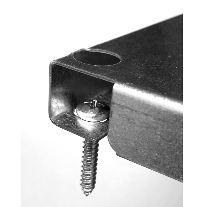 4 ft Metal Pegboard Organizer Kit showing the screws used to attach this pegboard to the wall