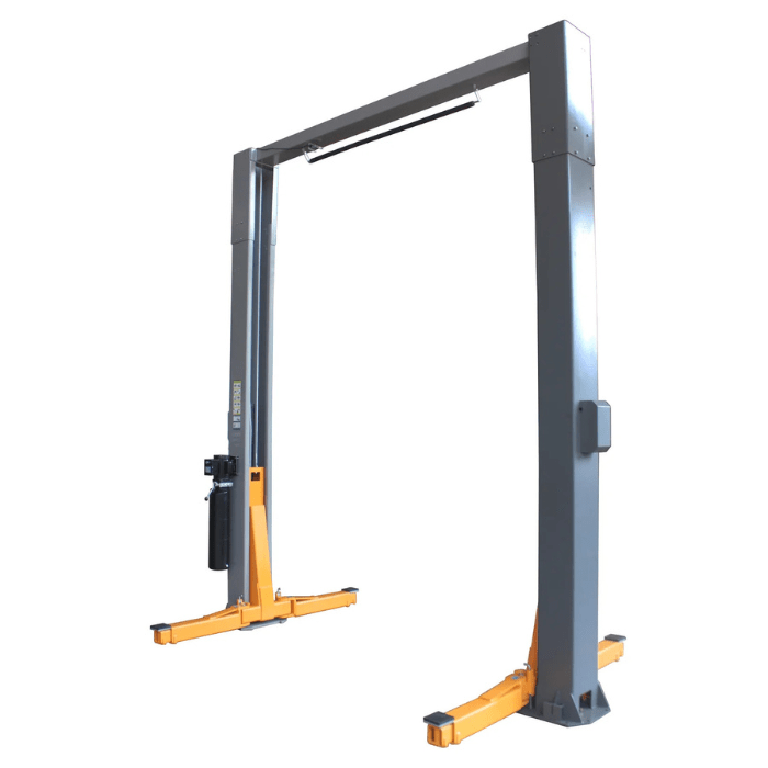 Angled perspective of the Triumph NTO-20S 20,000 lb Two-Post Overhead Car Lift with wide-set gray columns, oversized orange lift arms, and an overhead crossbar for maximum workspace clearance.