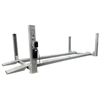 Angled view of the Triumph NTR-24 24,000 lb Heavy-Duty Four Post Vehicle Lift with diamond-plate runways, robust steel columns, and a powerful hydraulic motor.