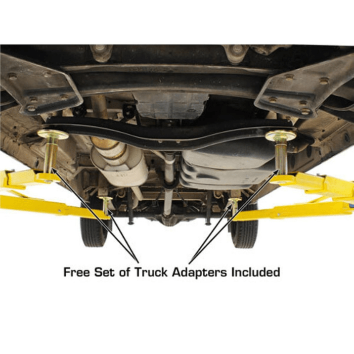 Atlas BP10000X 10000lb Baseplate Two Post Lift lifting underside of a vehicle with truck adapter set installed