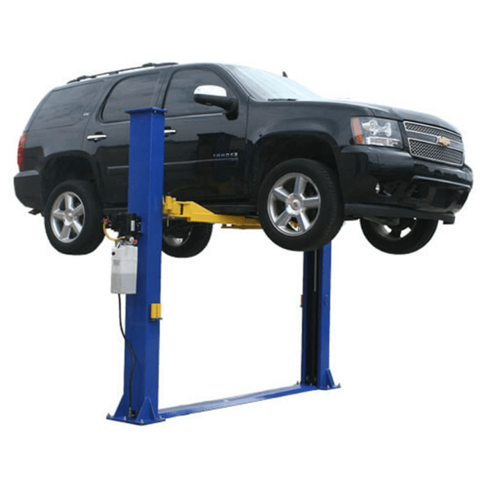 Atlas Baseplate 2-Post Lift – 9000 lb. Capacity (9KBPX) raising an SUV with yellow lift arms and blue columns for vehicle servicing