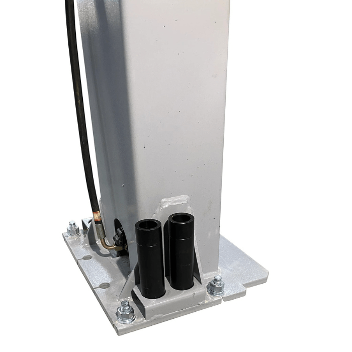 Base plate of the Triumph NTO-10A 10,000 lb Two-Post Car Lift featuring anchored hardware and hydraulic hose routing for stable, secure lifting.