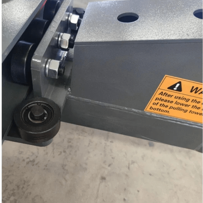 Close-up of Katool KT-299U Frame Machine structural joint with reinforced bolts and caster wheel assembly