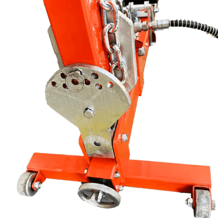 Close-up of Katool KT-YA260 Frame Straightener base with adjustable chain mount and caster wheels.