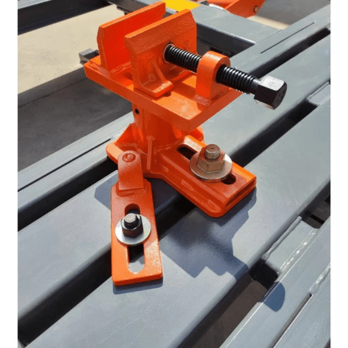 Close-up of adjustable clamp assembly on the Katool KT-198L Frame Machine with heavy-duty mounting bolts and slotted base