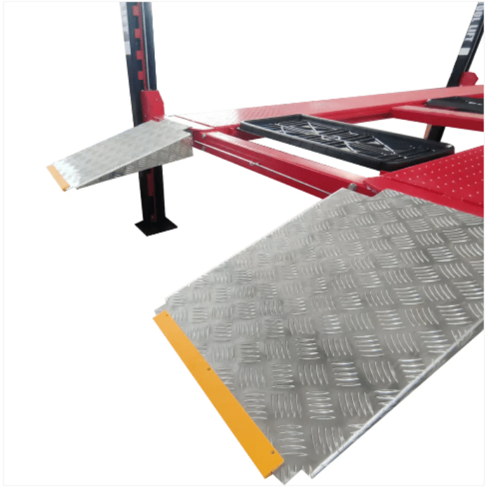 Close-up of diamond-plate drive-on ramps for the Katool KT-4H950 4 post vehicle lift.