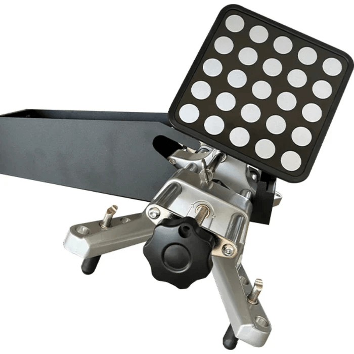 Close-up of the Katool AV533 alignment clamp assembly with a reflective target, used for precise 3D wheel measurements.