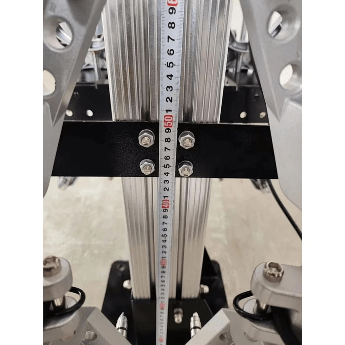 Close-up of the Katool KT-AV6 alignment machine’s central measuring scale and bracket hardware, used for precise calibration on two-post or scissor lifts.