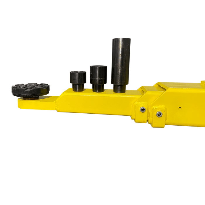 Close-up of the Triumph C7000 lift arm showing adjustable height adapters and heavy-duty lift pad design for versatile vehicle support.