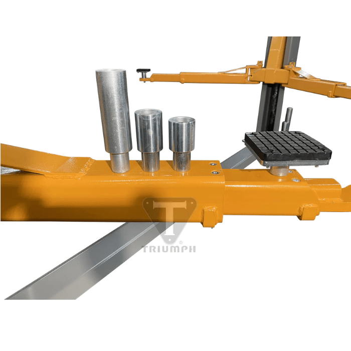 Close-up of the Triumph NT-11 lift arm showing three different height adapters and a rubber-padded lift pad, designed for customized vehicle contact points and added lifting precision.