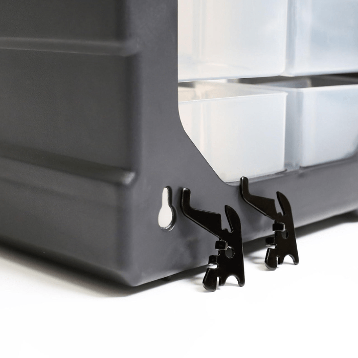 Closeup view of the peg and peghole for the Wall Controls 12-Drawer Pegboard Bin Cabinet