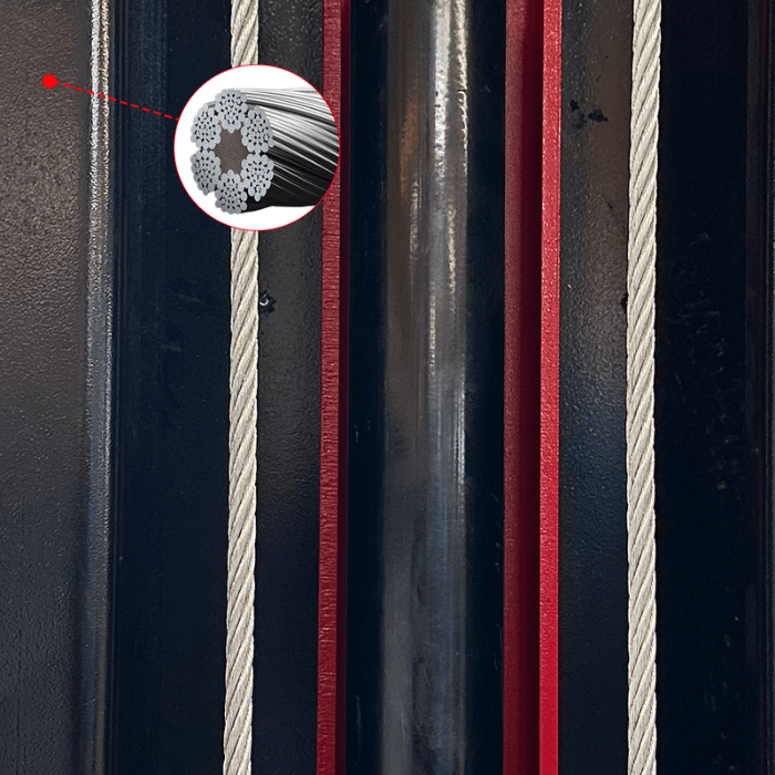 Cutaway detail of multi-strand aircraft-grade lifting cable used in the KT-M150D 15,000 lb two post lift’s direct-drive system.