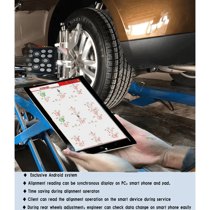 Demonstration of the Katool KT-AV651 alignment machine with a tablet displaying real-time wheel data, while a vehicle’s tire is clamped for measurement.