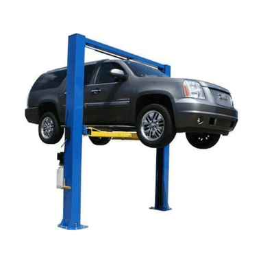 Front-right perspective of the Atlas OHX10000X lifting a full-size SUV, with its overhead bar and extended column height on display.