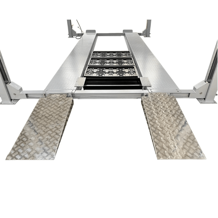 Front approach of the Triumph 11,000 lb Four Post Vehicle Lift (NSS-11), highlighting the diamond-plate ramps, sturdy runways, and ample drive-on space for vehicle service.