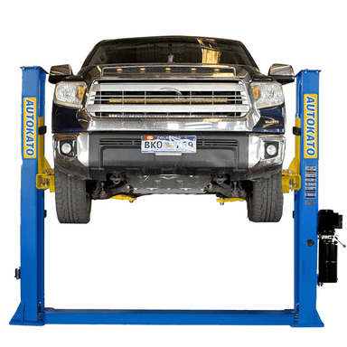 Front side view of the Katool AK-H115Z Vehicle Lift holding up a truck
