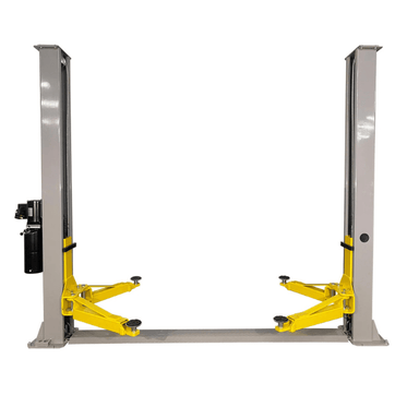 Front view of the Triumph NT-9 two-post car lift featuring yellow arms and overhead cable design for efficient auto repair access