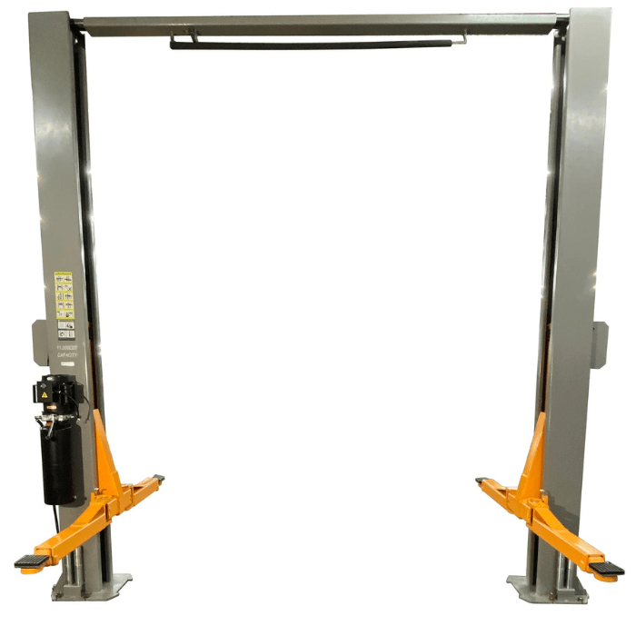 Front view of the Triumph NTO-11A Lift with dual gray steel columns, vibrant orange lift arms, and an overhead bar designed for smooth cable routing and optimal clearance.