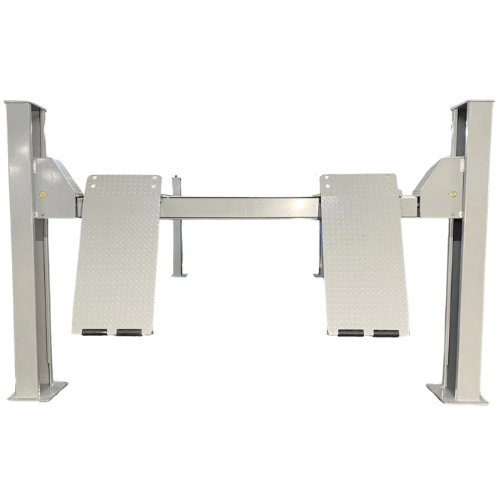 Front view of the Triumph NTR-32 Vehicle Lift with elevated diamond-plate ramps and tall steel columns.