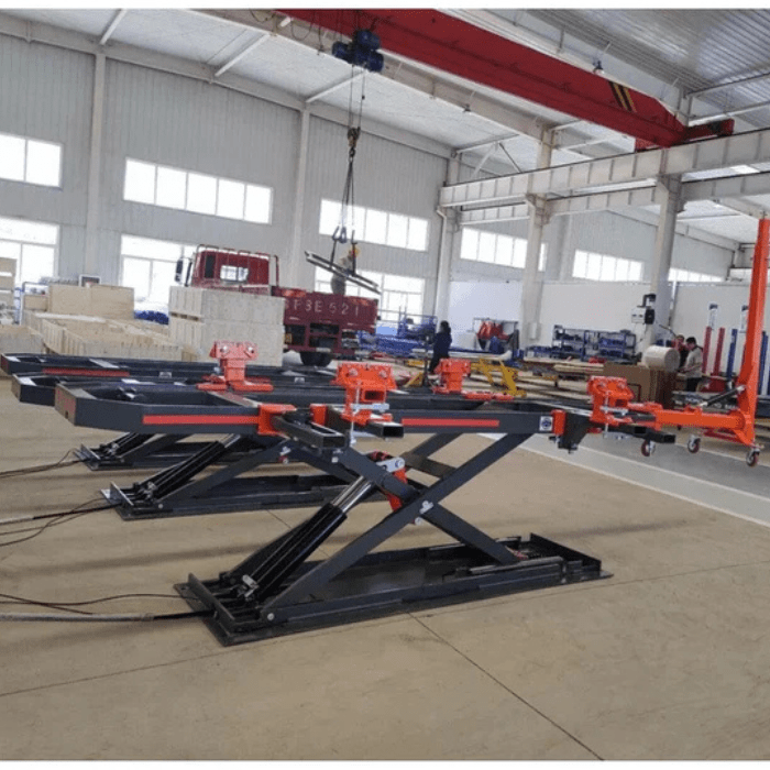 Katool KT-310 Professional-Grade Auto Body Frame Machine with scissor lift system in industrial workshop setting