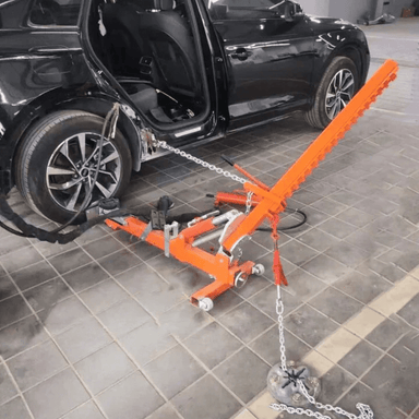 Katool KT-YA260 Auto Body Frame Straightener – live demo setup pulling rear quarter panel on black vehicle with hydraulic and chain anchoring system.