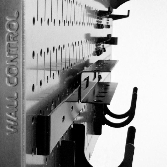 Left side view of the 16in x 32in Horizontal Metal Pegboard with black accessories