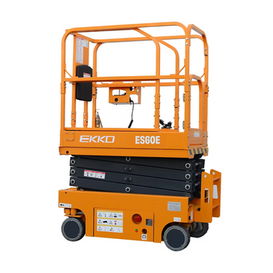 Orange ES60E electric scissor lift in its lowest position, highlighting compact folded height and drive wheels