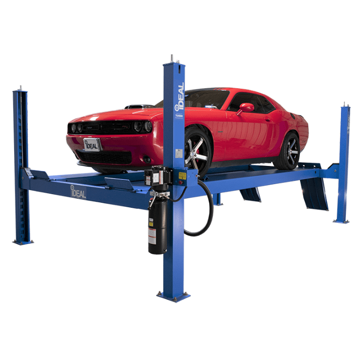 Red Dodge Challenger parked on top of a blue iDEAL FP14KC-X 4-post vehicle lift.