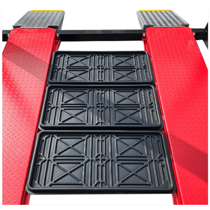Removable plastic drip trays positioned on the runways of the Katool KT-4H950 4 post lift.