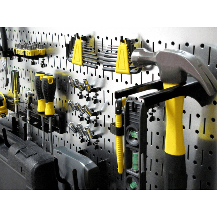 Right side view of the Wall Controls 16in x 32in Horizontal Metal Pegboard with tools and black accessories
