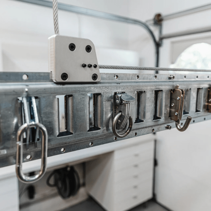 Showing a side view of the cable and hooks on the Auxx-One motorized storage lift