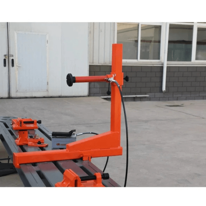 Side view of pulling arm and clamp setup on the Katool KT-198L Auto Body Frame Machine for precision frame straightening