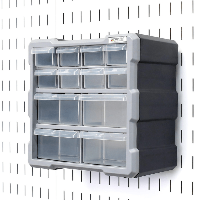 The 12-Drawer Pegboard Bin Cabinet by wall control mounted to a white pegboard