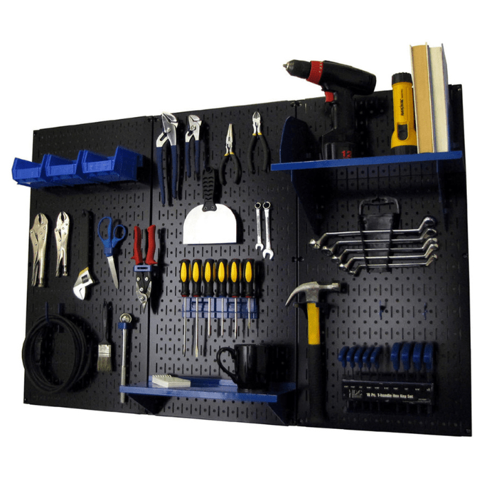 The 4ft Metal Pegboard by Wall Control with blue accessories and tools on each accessory