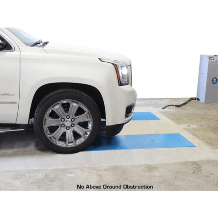 The Atlas FM9SL in-ground lift leaves no above-ground obstructions—perfect for shops needing a flush floor setup with full drive-over convenience.