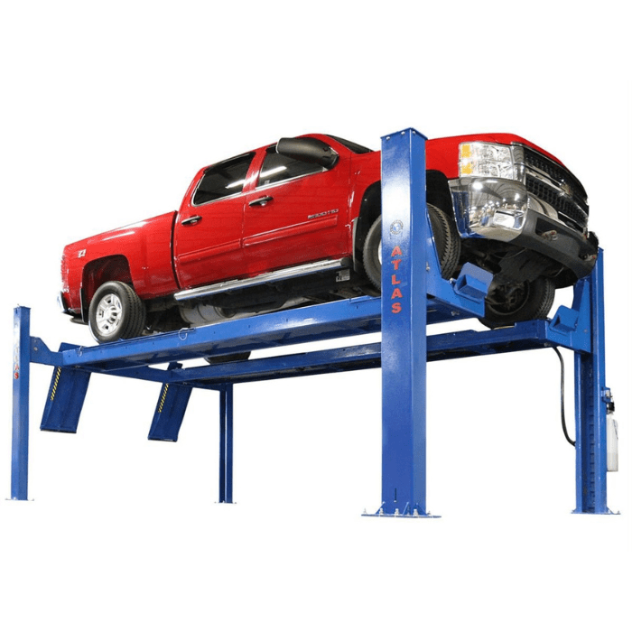 The Atlas PVL14OF-EXT 14,000 lb. alignment lift is shown supporting a full-size pickup—perfect for shops that work on heavy vehicles requiring four-wheel alignment and extended platform length.