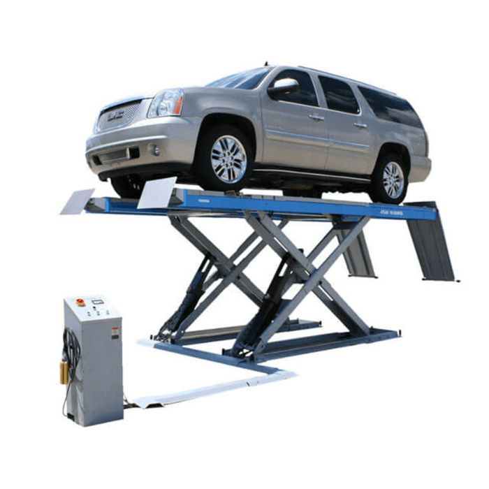 The Atlas SLP9K is shown lifting a full-size SUV with ease, providing 9,000 lbs. of lifting capacity—perfect for complete vehicle access in high-demand shops.