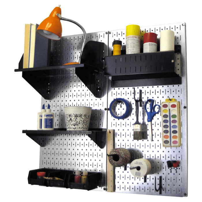 The Craft Hobby Organizer Pegboard Kit with metallic pegboard and black accessories with materials