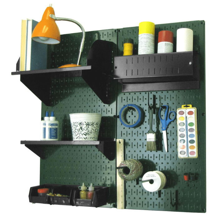 The Craft Hobby Pegboard Organizer Kit with green pegboard and black accessories with materials
