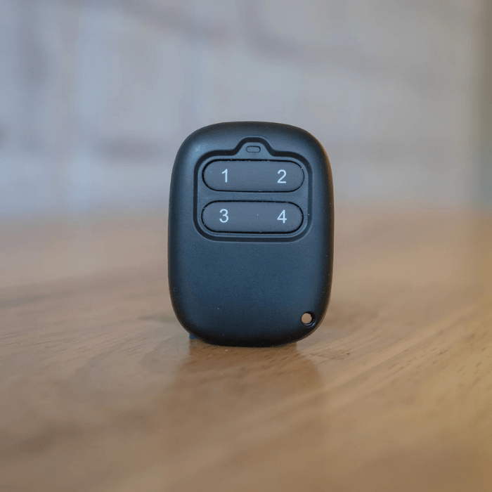 The Extra Wireless Remote by Auxx-Lift on a table