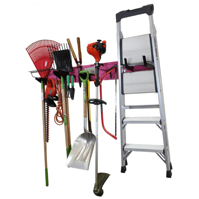 The Garage Storage Organizer Rack with pink pegboard and black accessories with tools