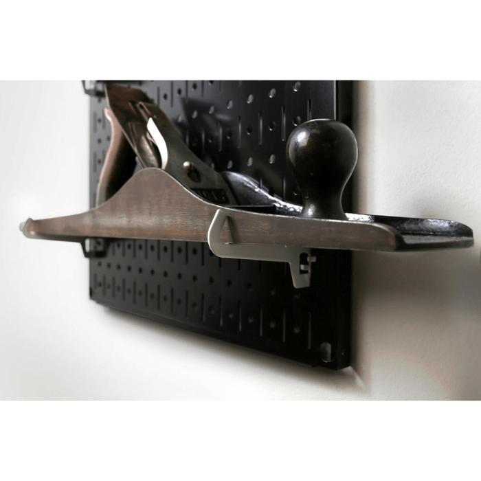 The Lazy Guy DIY Maker Woodworking Tool Storage Set with a black pegboard and a tool close-up