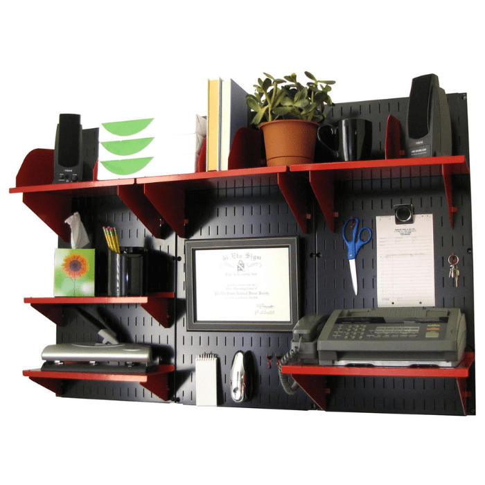 The Wall-Mounted Home Office Kit by Wall Control with a black pegboard and red accessories