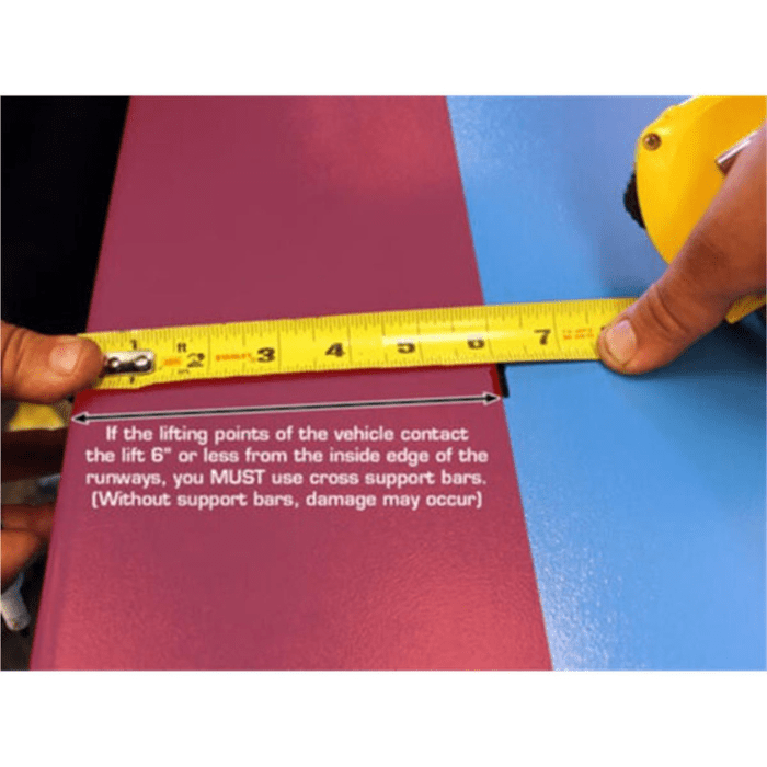 When a vehicle's lifting points are within 6 inches of the runway's inner edge, cross support bars are required for safe lifting—failure to use them may result in equipment damage.