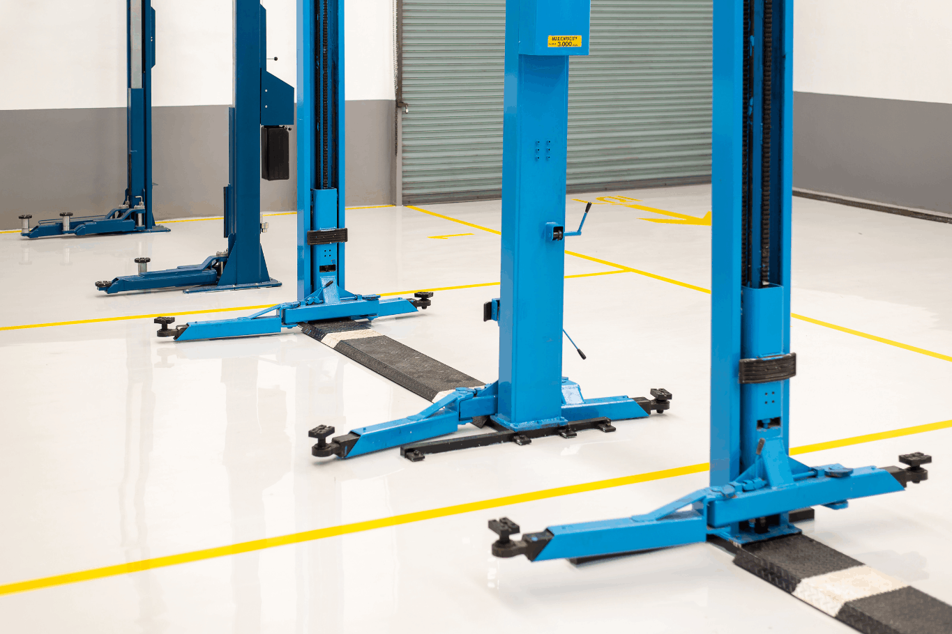hero image for the How to Install a 2-Post Car Lift Step-by-Step Guide Blog