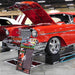 Show car on Race Ramps 12 inch wheel cribs at an indoor event