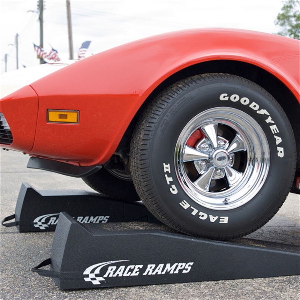 Corvette front wheel parked on a Race Ramps 56 inch ramp