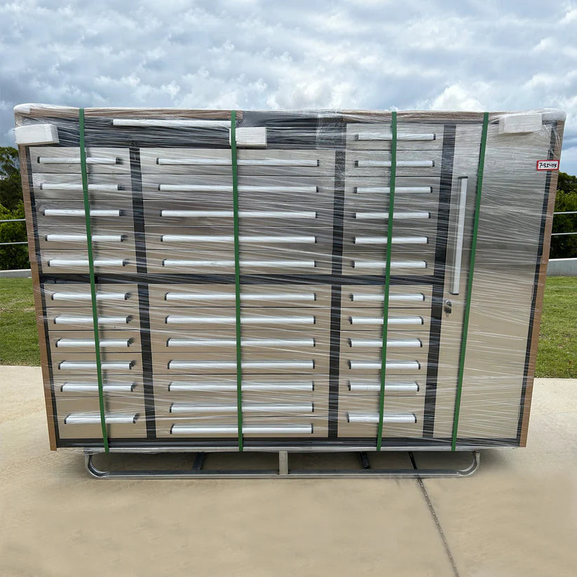 7ft stainless steel storage cabinet wrapped for shipping on metal pallet base by Chery Industrial