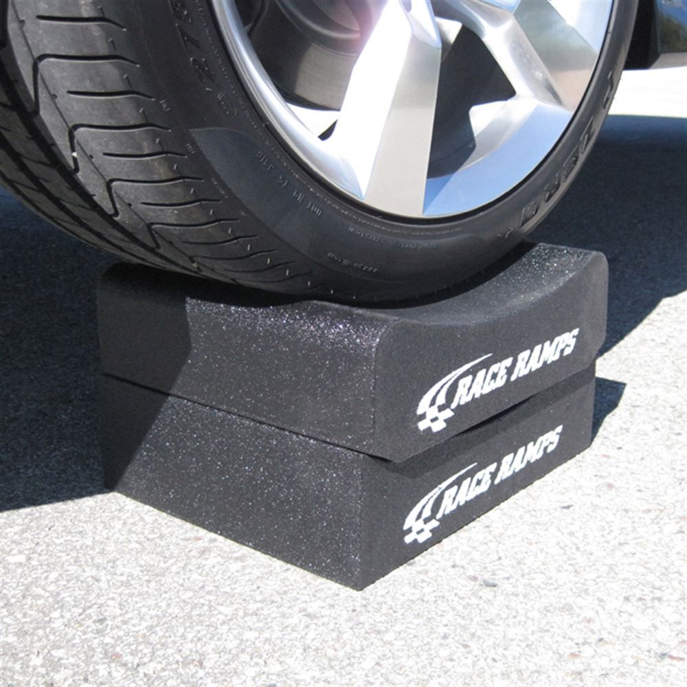 Tire supported on a stacked two piece Race Ramps wheel crib