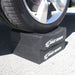 Tire supported on a stacked two piece Race Ramps wheel crib